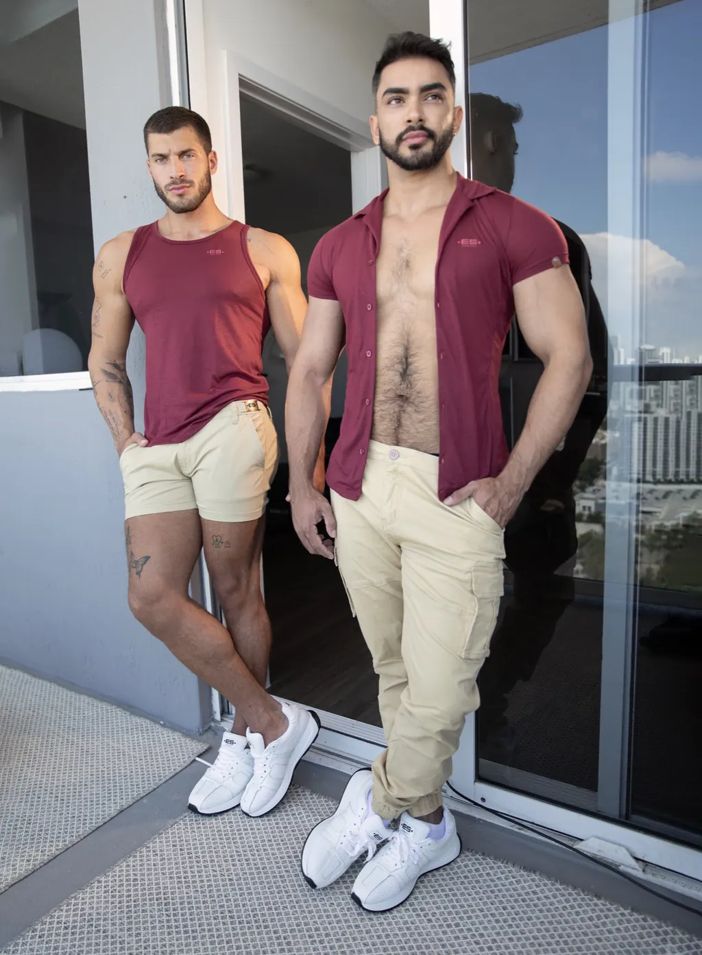 Two ES Collection models in burgundy tops and light trousers in Miami